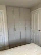 4 door fitted wardrobes with shaker design in light grey, fitted in Grey Towers Village